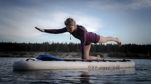 SUP (Stand Up Paddle Board) Yoga .